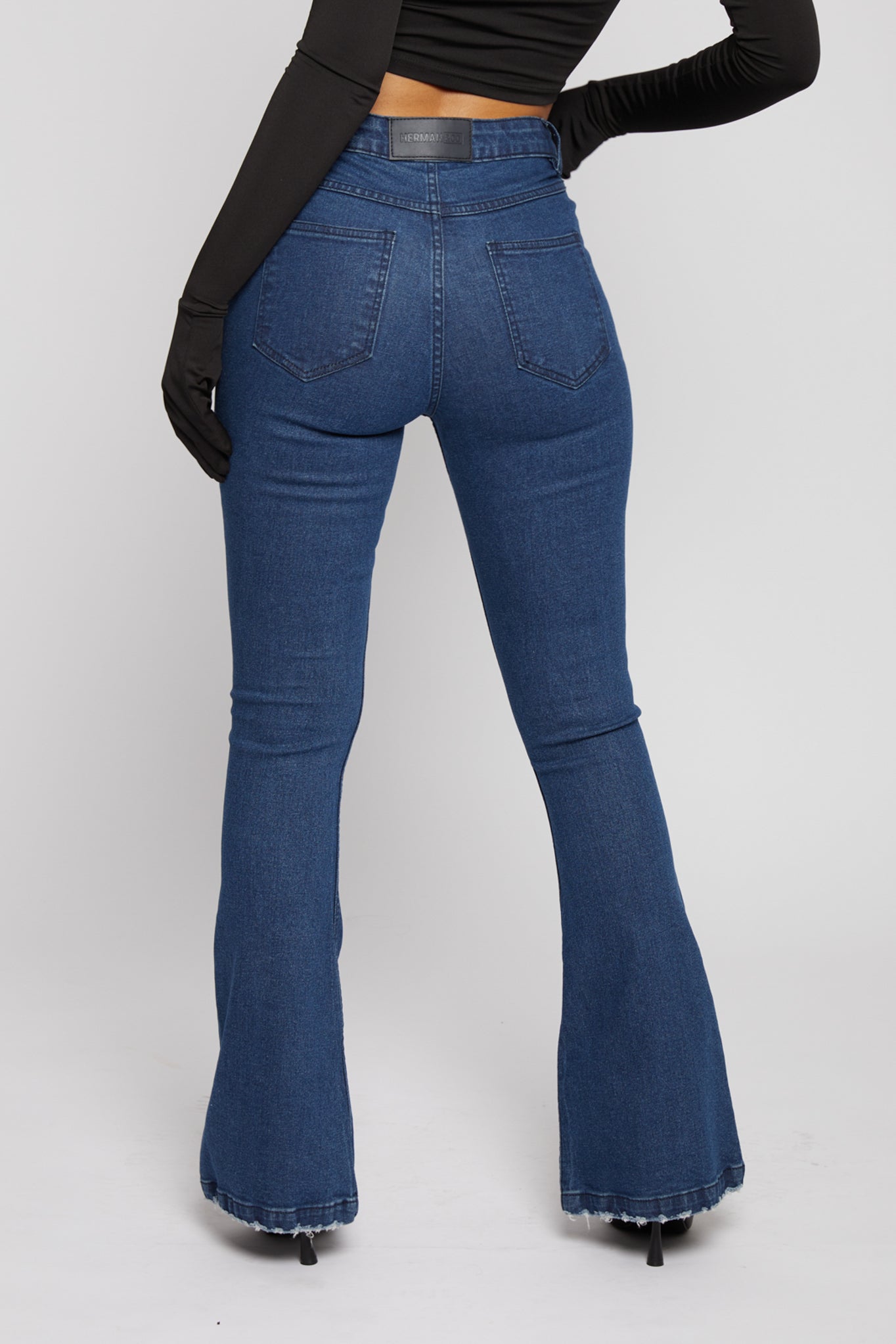 DISTRESSED FLARE JEANS - DARK BLUE